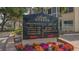 Siesta Harbor community directory with street names and community features with flower bed in the front at 1250 N Portofino Dr # 303, Sarasota, FL 34242