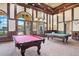 A game room area showcasing two beautiful billiard tables, for the residents at 13145 Amerigo Ln, Venice, FL 34293