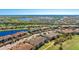 Scenic condo community near a lake offering a serene environment and golf course views at 13719 Messina Loop # 101, Lakewood Ranch, FL 34211