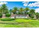 Elegant stone entrance sign for Esplanade Golf & Country Club set amidst lush landscaping at 13719 Messina Loop # 101, Lakewood Ranch, FL 34211