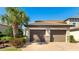 Close up of the townhome units with private garages at 13719 Messina Loop # 101, Lakewood Ranch, FL 34211