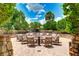Inviting community outdoor firepit area with ample seating, perfect for gatherings and relaxation at 13719 Messina Loop # 101, Lakewood Ranch, FL 34211