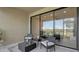 Comfortable outdoor patio featuring modern furniture and a view of the golf course at 13719 Messina Loop # 101, Lakewood Ranch, FL 34211