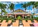 Relaxing poolside with plenty of lounge chairs near the Bahama Bar for the best in community living at 13719 Messina Loop # 101, Lakewood Ranch, FL 34211