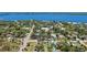 Aerial view highlighting the property's proximity to the water and other residential areas at 1406 5Th W St, Palmetto, FL 34221