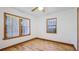 Simple bedroom with multiple windows offering great light and hardwood floors at 1406 5Th W St, Palmetto, FL 34221