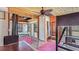 Comfortable living space with wood ceilings, ceiling fans, and built in bunk beds at 1406 5Th W St, Palmetto, FL 34221