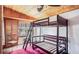 Compact living area with wood ceilings, bunk beds and lots of natural light at 1406 5Th W St, Palmetto, FL 34221