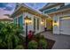 Well-manicured landscaping accents the exterior of this single-Gathering home at 15430 Blackmoor Ter, Lakewood Ranch, FL 34202