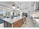 Spacious kitchen boasts a large island, modern appliances, and ample counter space at 15430 Blackmoor Ter, Lakewood Ranch, FL 34202