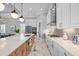 Stylish kitchen with stainless steel appliances, island, and open concept design at 15430 Blackmoor Ter, Lakewood Ranch, FL 34202