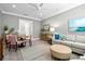 Inviting living room with comfortable seating, stylish decor, and ample natural light at 15430 Blackmoor Ter, Lakewood Ranch, FL 34202