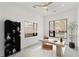 Stylish home office with modern furnishings, natural light, and a ceiling fan at 1716 9Th St, Sarasota, FL 34236