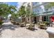 Inviting outdoor patio with ample seating, perfect for enjoying meals or drinks outside at 1716 9Th St, Sarasota, FL 34236
