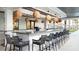 The clubhouse bar area featuring elegant seating, stylish decor, and a welcoming atmosphere at 17216 Star Banks St, Wimauma, FL 33598