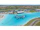 Expansive aqua lagoon with an inflatable water park, and watersport rentals at 17216 Star Banks St, Wimauma, FL 33598