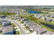 Neighborhood aerial shot showcases the community's layout with a central pond at 17715 Cantarina Cv, Bradenton, FL 34211