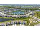 Gorgeous aerial view of a lovely community with multiple lakes and many single-Gathering homes at 17715 Cantarina Cv, Bradenton, FL 34211