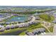 Aerial view of a community with ponds, greenery, and well-maintained homes at 17715 Cantarina Cv, Bradenton, FL 34211