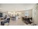 Spacious living area featuring a modern kitchen with stainless steel appliances and ample seating at 17715 Cantarina Cv, Bradenton, FL 34211
