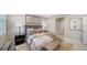 Comfortable main bedroom with decoratively pillows and decor at 17715 Cantarina Cv, Bradenton, FL 34211
