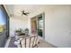 Spacious screened lanai with comfortable seating and an open view to the home's interior at 17715 Cantarina Cv, Bradenton, FL 34211