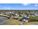 Waterfront homes in a neighborhood with views of the bay and private boat docks at 1815 Palma Sola Blvd, Bradenton, FL 34209