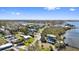 Waterfront neighborhood showcasing lush green landscapes and beautiful bay views at 1815 Palma Sola Blvd, Bradenton, FL 34209
