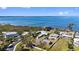Waterfront property with mature landscaping, bay views, and easy boating access at 1815 Palma Sola Blvd, Bradenton, FL 34209