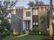 Exterior facade with water feature and manicured front yard at 212 S Renellie Dr, Tampa, FL 33609