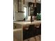 Modern kitchen features a large island with bar seating and stainless steel appliances at 212 S Renellie Dr, Tampa, FL 33609