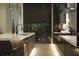 Contemporary kitchen showcasing an island with seating and modern stainless steel appliances at 212 S Renellie Dr, Tampa, FL 33609