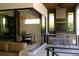 An expansive outdoor patio featuring outdoor kitchen area and open dining space at 212 S Renellie Dr, Tampa, FL 33609