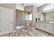 Clean, modern bathroom featuring double sinks and spacious shower at 22209 Deer Pointe Xing, Bradenton, FL 34202