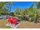 Picturesque pond view with comfortable seating, ideal for enjoying nature and outdoor relaxation at 2515 49Th St, Sarasota, FL 34234