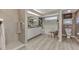 Well-lit bathroom featuring a shower, soaking tub, vanity with a sink, and neutral decor at 3514 Laslo Ave, North Port, FL 34287