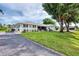 Attractive home with a neatly landscaped yard and visible house number on the facade at 3514 Laslo Ave, North Port, FL 34287