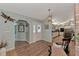 Bright and spacious foyer leading to the kitchen with an open-concept design at 3514 Laslo Ave, North Port, FL 34287