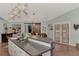 Kitchen island features breakfast bar and prep sink at 3514 Laslo Ave, North Port, FL 34287