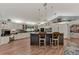 Bright kitchen featuring a large island, ample cabinetry, and workstation at 3514 Laslo Ave, North Port, FL 34287