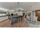 Well-equipped kitchen with an island, dining space, and modern appliances, perfect for entertaining at 3514 Laslo Ave, North Port, FL 34287