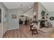 Open-concept living area with a fireplace, kitchen, and dining area in a single, continuous space at 3514 Laslo Ave, North Port, FL 34287