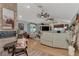Spacious living room featuring a large entertainment center and comfortable seating at 3514 Laslo Ave, North Port, FL 34287