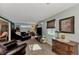 Cozy living room offering comfortable seating, ambient lighting, and relaxing atmosphere at 3514 Laslo Ave, North Port, FL 34287