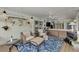 Relaxing sunroom with comfortable seating, a ceiling fan, and views of the outdoors at 3514 Laslo Ave, North Port, FL 34287