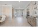 Bright hallway with tile flooring, crown molding, and tasteful decorations at 3564 Santa Caterina Blvd, Lakewood Ranch, FL 34211