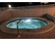 Relaxing hot tub provides a tranquil spot for unwinding and enjoying the evening ambiance at 3784 59Th W Ave # 3784, Bradenton, FL 34210