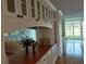Elegant built-in cabinets provide ample storage space, complemented by a stylish counter and glass-fronted display areas at 3790 Pinebrook Cir # 103, Bradenton, FL 34209