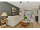 Cozy living room featuring a dark accent wall and modern decor at 400 Nokomis S Ave, Venice, FL 34285