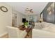 Spacious living room showcasing neutral colors, comfortable seating, and natural light at 400 Nokomis S Ave, Venice, FL 34285